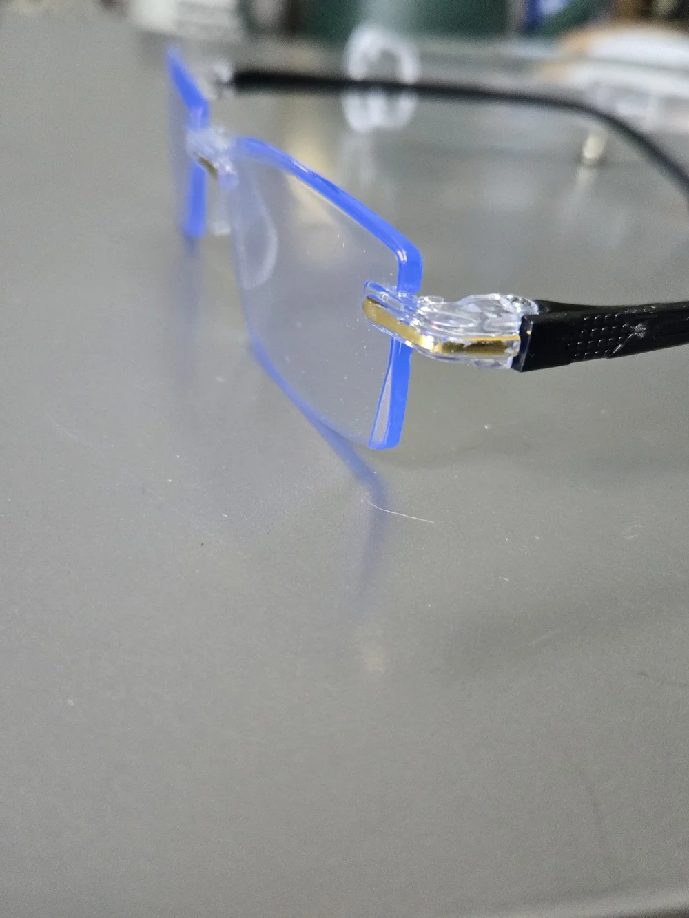 Rimless Blue-Light Reading Glasses with Black Temples and Gold Accents